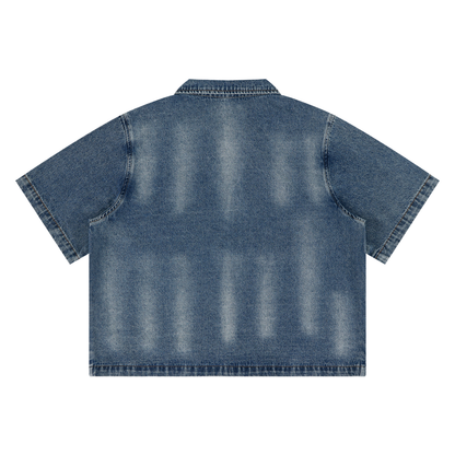 Chemise zippée bleue effet washed à manches courtes, avec visuel artistique signé Bandit représentant deux aigles, un symbole peace et des détails inspirés du drapeau américain.